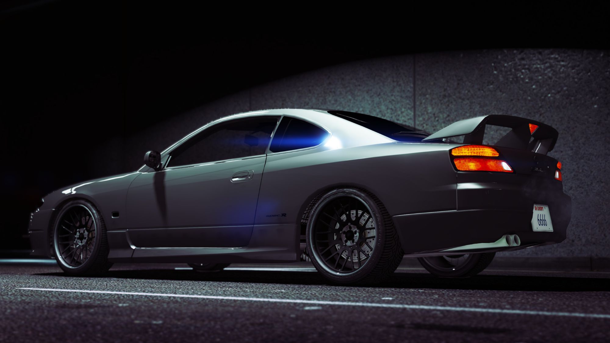 A modified car is showcased in the dark of the night, highlighting the best car mods